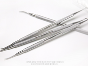 DIAMI 2 way curette