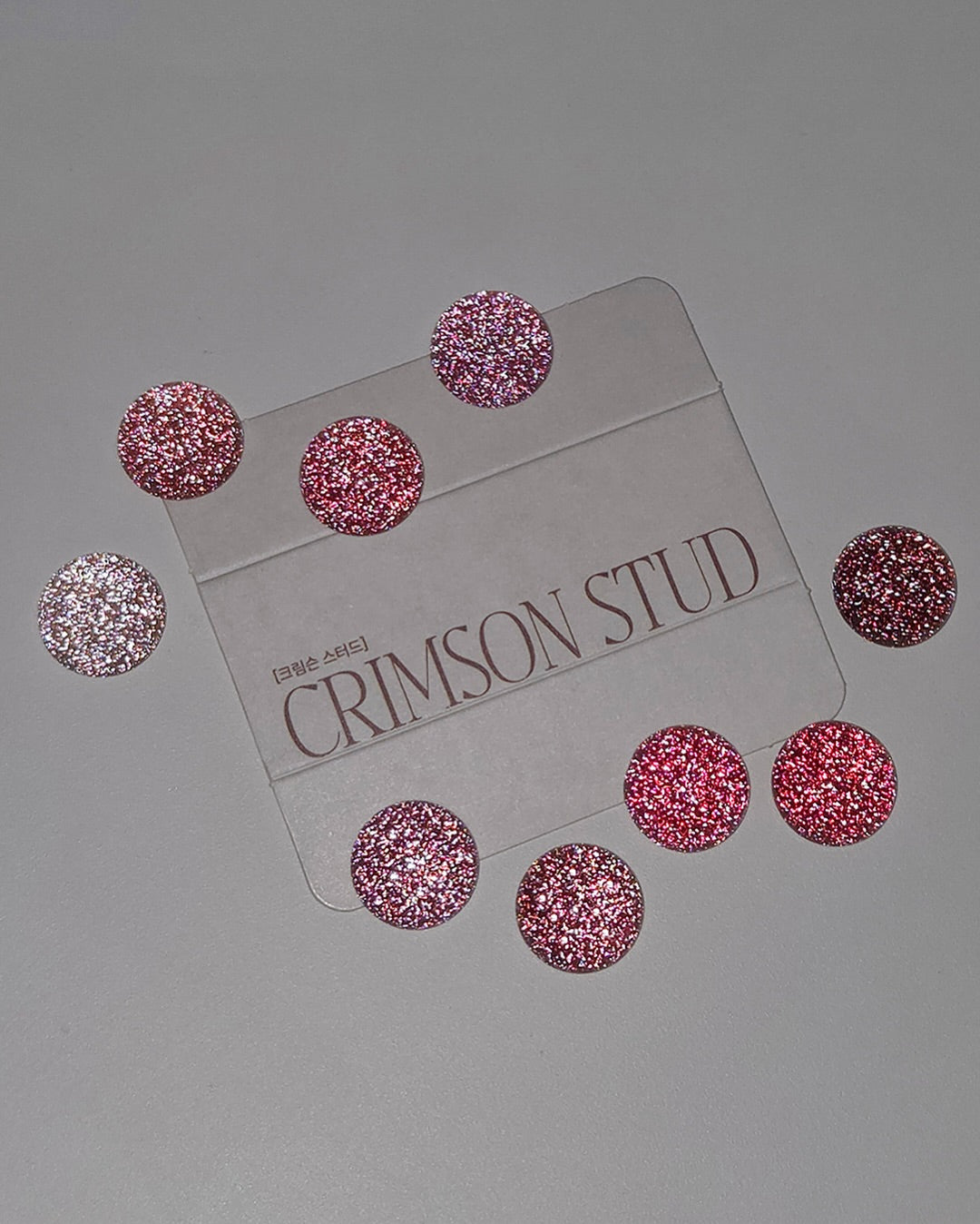 FROM THE NAIL Crimson stud